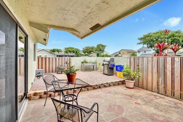 5680 Northpointe Ln, Boynton Beach, FL 33437 - view of patio / terrace featuring a fenced backyard and grilling area