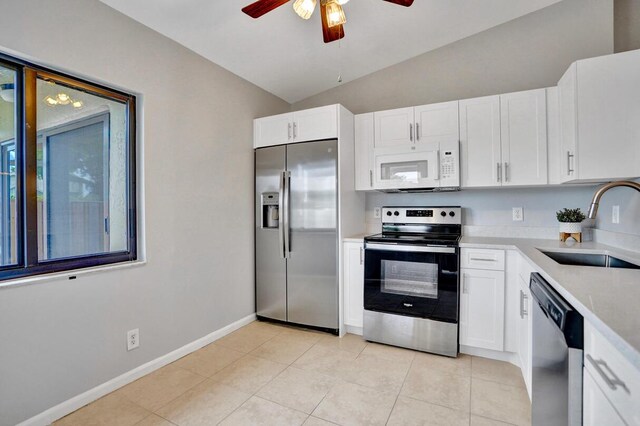 5680 Northpointe Ln, Boynton Beach, FL 33437 - kitchen with ceiling fan, a sink, light countertops, stainless steel appliances, and lofted ceiling