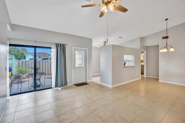 5680 Northpointe Ln, Boynton Beach, FL 33437 - entrance foyer with light tile patterned floors, baseboards, and ceiling fan with notable chandelier