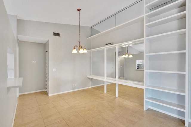 5680 Northpointe Ln, Boynton Beach, FL 33437 - unfurnished dining area with visible vents, baseboards, tile patterned floors, and a chandelier