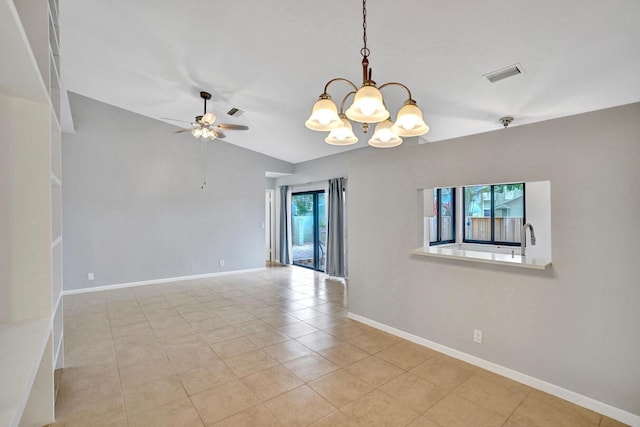 5680 Northpointe Ln, Boynton Beach, FL 33437 - empty room with visible vents, baseboards, lofted ceiling, and light tile patterned flooring