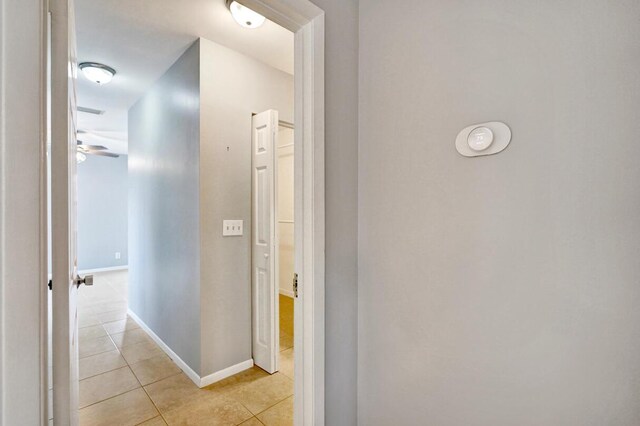 5680 Northpointe Ln, Boynton Beach, FL 33437 - hallway featuring baseboards and light tile patterned flooring