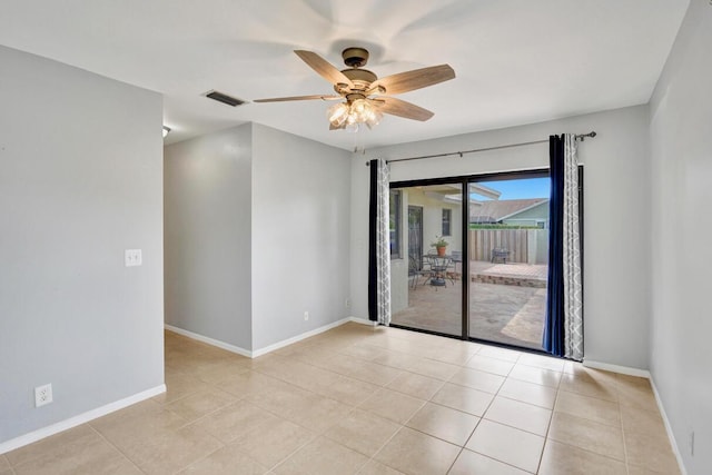 5680 Northpointe Ln, Boynton Beach, FL 33437 - spare room featuring a ceiling fan, baseboards, visible vents, and light tile patterned floors