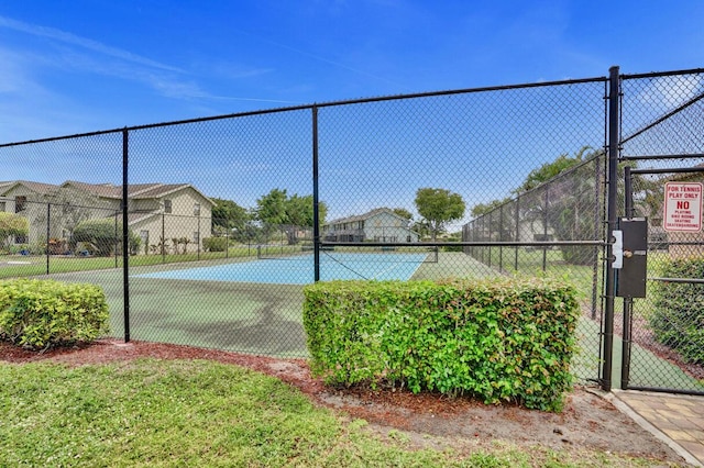5680 Northpointe Ln, Boynton Beach, FL 33437 - view of sport court with fence and a gate