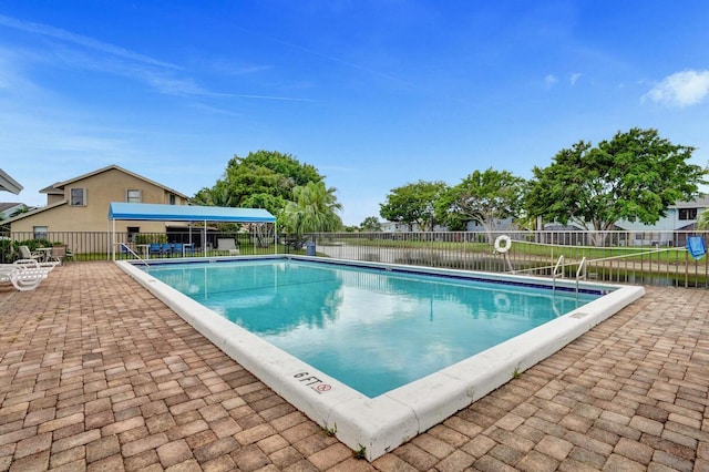 5680 Northpointe Ln, Boynton Beach, FL 33437 - pool with fence and a patio area