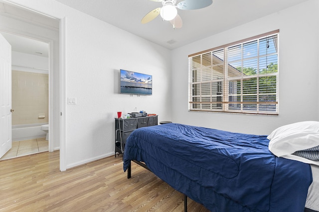 600 NW 24th Ave, Boynton Beach, FL 33426 - bedroom with light wood finished floors, baseboards, and ceiling fan