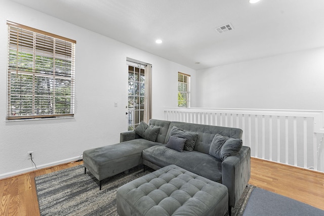 600 NW 24th Ave, Boynton Beach, FL 33426 - living room with wood finished floors, recessed lighting, and baseboards