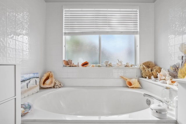 bathroom featuring a garden tub