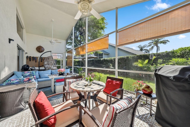 sunroom with an outdoor hangout area and ceiling fan
