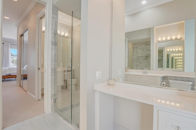 ensuite bathroom featuring crown molding, toilet, recessed lighting, baseboards, and a shower stall