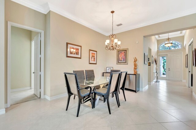 6722 Watertown Dr, Boynton Beach, FL 33437 - dining area with baseboards, a chandelier, crown molding, light tile patterned flooring, and visible vents