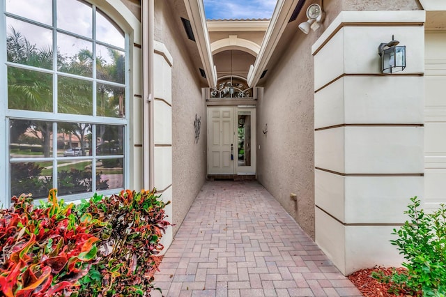 6722 Watertown Dr, Boynton Beach, FL 33437 - doorway to property featuring stucco siding
