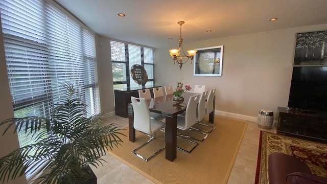 dining area featuring baseboards, recessed lighting, a notable chandelier, and light tile patterned floors