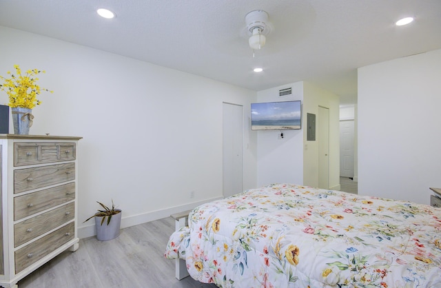11 Colonial Club Dr Unit 302, Boynton Beach, FL 33435 - bedroom featuring wood finished floors, electric panel, recessed lighting, a closet, and baseboards