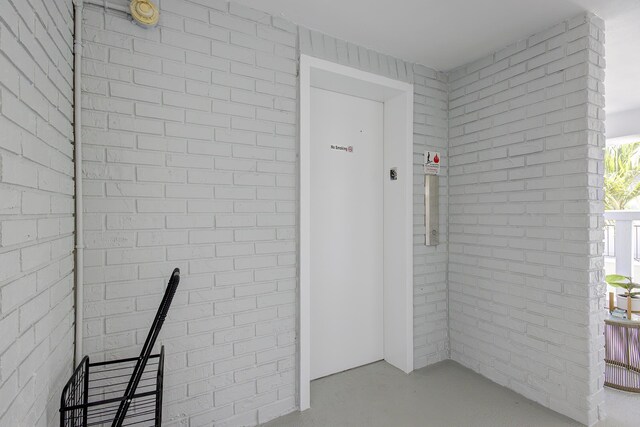 11 Colonial Club Dr Unit 302, Boynton Beach, FL 33435 - entrance to property featuring elevator