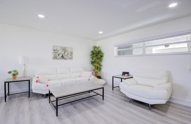 11 Colonial Club Dr Unit 302, Boynton Beach, FL 33435 - living room with wood finished floors, baseboards, and recessed lighting