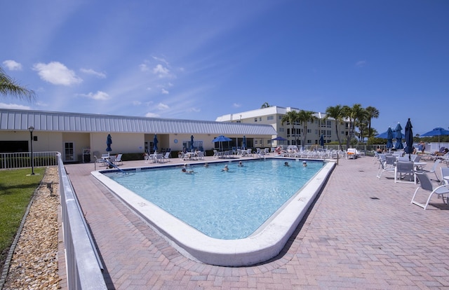 11 Colonial Club Dr Unit 302, Boynton Beach, FL 33435 - community pool featuring fence and a patio area