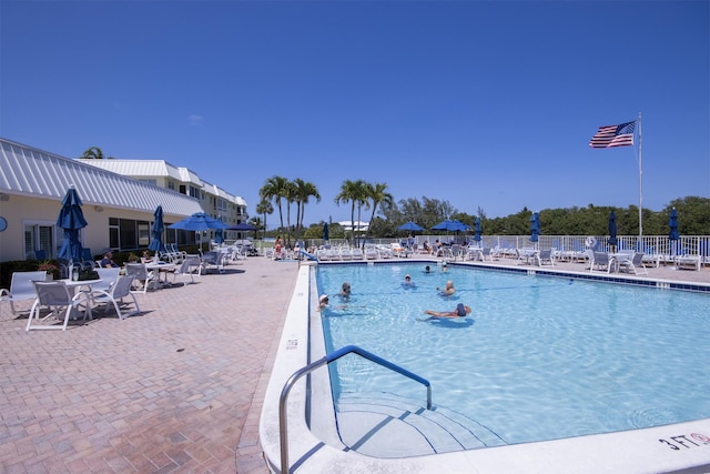 11 Colonial Club Dr Unit 302, Boynton Beach, FL 33435 - community pool featuring fence and a patio area