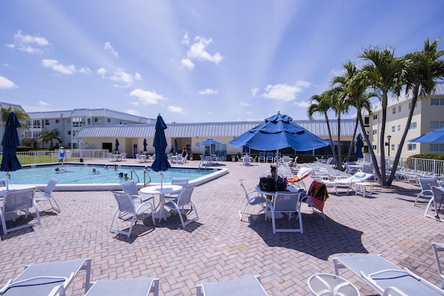 11 Colonial Club Dr Unit 302, Boynton Beach, FL 33435 - community pool featuring fence and a patio area