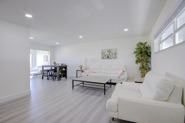 11 Colonial Club Dr Unit 302, Boynton Beach, FL 33435 - living area with light wood-style floors, recessed lighting, and baseboards