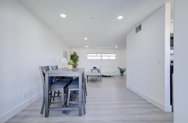 11 Colonial Club Dr Unit 302, Boynton Beach, FL 33435 - dining room featuring recessed lighting, light wood-style flooring, and baseboards