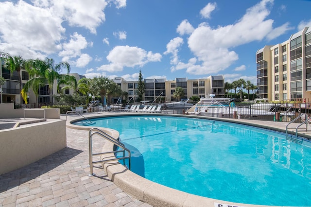 pool with a patio
