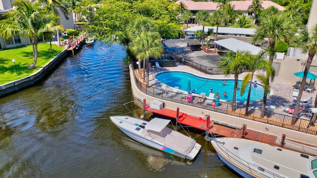birds eye view of property with a water view