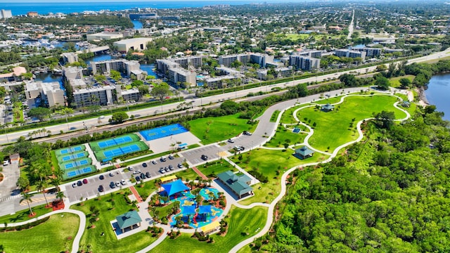 drone / aerial view with a view of city and a water view
