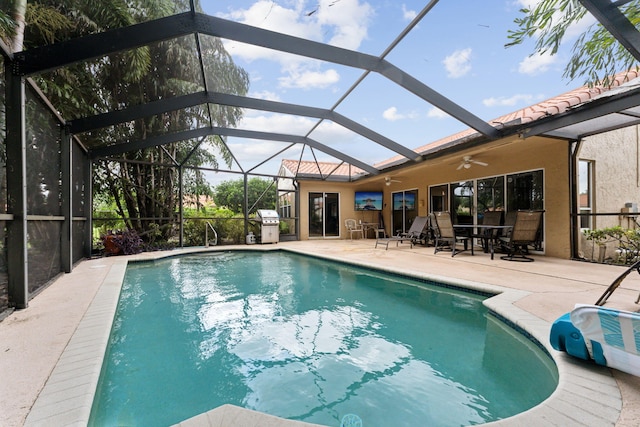 8004 Copenhagen Way, Boca Raton, FL 33434 - swimming pool with a ceiling fan, a patio area, grilling area, and glass enclosure