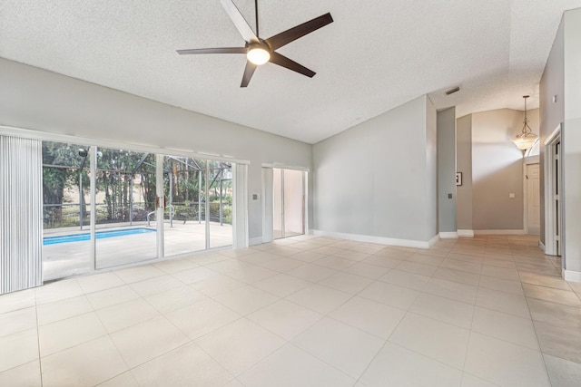 8004 Copenhagen Way, Boca Raton, FL 33434 - spare room with lofted ceiling, a ceiling fan, a textured ceiling, and light tile patterned flooring