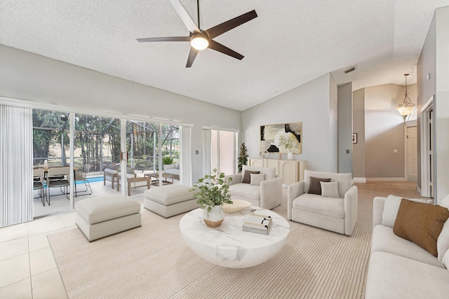 8004 Copenhagen Way, Boca Raton, FL 33434 - living area with ceiling fan, a textured ceiling, tile patterned flooring, and lofted ceiling