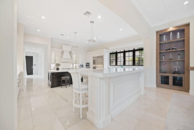 9650 Eden Mnr, Parkland, FL 33076 - kitchen featuring light countertops, recessed lighting, ornamental molding, and stainless steel built in refrigerator