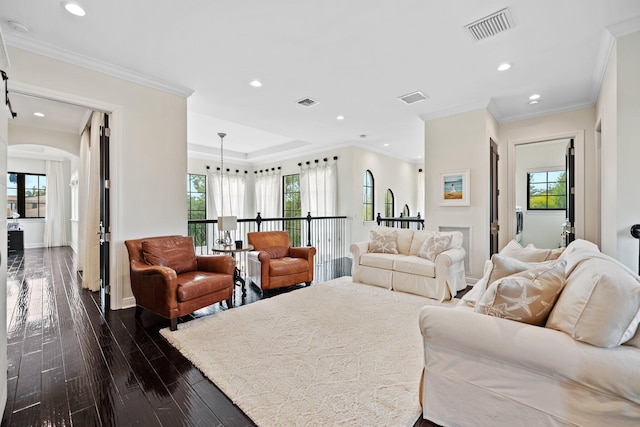 9650 Eden Mnr, Parkland, FL 33076 - living area featuring dark wood finished floors, arched walkways, recessed lighting, and visible vents