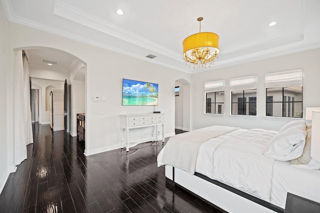 9650 Eden Mnr, Parkland, FL 33076 - bedroom with an inviting chandelier, arched walkways, a raised ceiling, and hardwood / wood-style floors