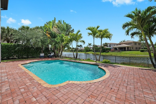 9650 Eden Mnr, Parkland, FL 33076 - view of pool with a water view, a fenced in pool, a fenced backyard, and a patio area