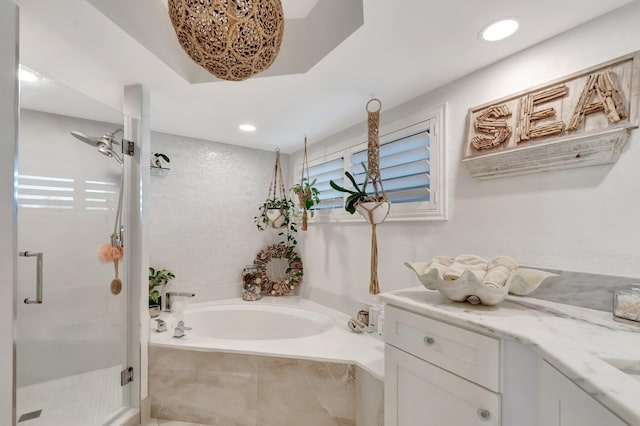 5279 Fountains Dr S Unit 304, Lake Worth, FL 33467 - full bathroom featuring a stall shower, a garden tub, vanity, and recessed lighting