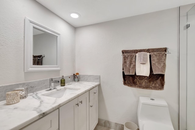 5279 Fountains Dr S Unit 304, Lake Worth, FL 33467 - bathroom with vanity, toilet, and baseboards