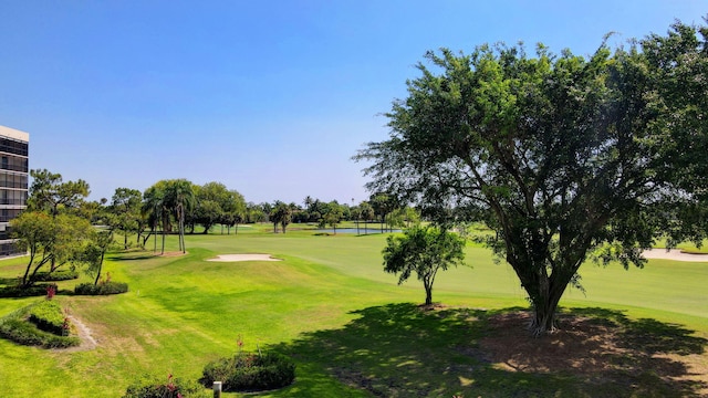 5279 Fountains Dr S Unit 304, Lake Worth, FL 33467 - view of community with view of golf course, a yard, and a water view