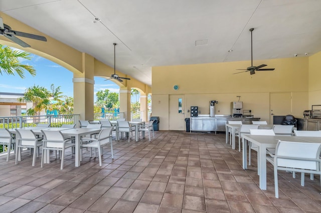 5279 Fountains Dr S Unit 304, Lake Worth, FL 33467 - view of patio / terrace featuring outdoor dining space, area for grilling, and ceiling fan