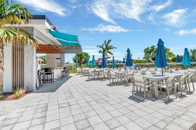 5279 Fountains Dr S Unit 304, Lake Worth, FL 33467 - view of patio / terrace featuring outdoor dining area