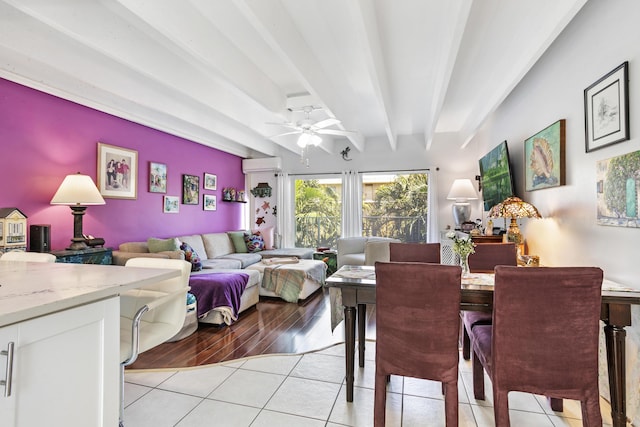 4001 S Ocean Blvd Unit 218, South Palm Beach, FL 33480 - dining room with a wall mounted air conditioner, light tile patterned floors, beamed ceiling, and a ceiling fan