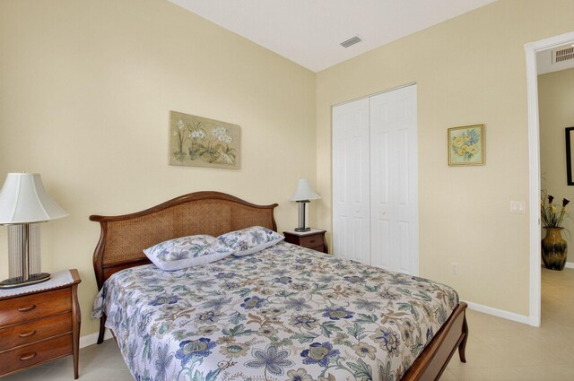 6863 Imperial Beach Cir, Delray Beach, FL 33446 - bedroom featuring a closet, light tile patterned floors, and baseboards
