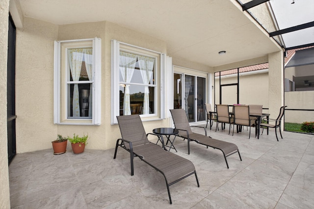 6863 Imperial Beach Cir, Delray Beach, FL 33446 - view of patio / terrace with glass enclosure and outdoor dining space
