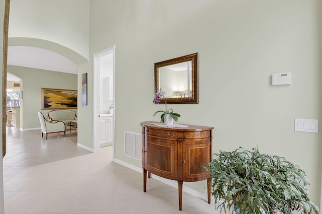 6863 Imperial Beach Cir, Delray Beach, FL 33446 - hall featuring arched walkways and baseboards