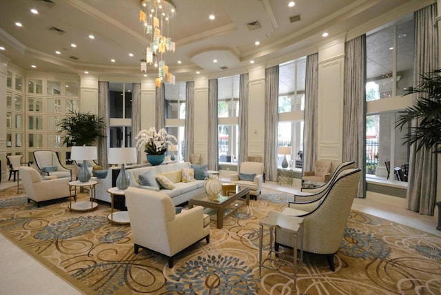 6863 Imperial Beach Cir, Delray Beach, FL 33446 - lobby with a high ceiling, ornamental molding, a decorative wall, and recessed lighting