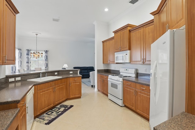 477 NW Blue Lake Dr, Port Saint Lucie, FL 34986 - kitchen with white appliances, a sink, crown molding, brown cabinetry, and a chandelier