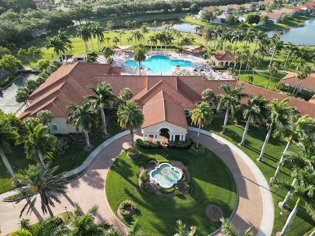 477 NW Blue Lake Dr, Port Saint Lucie, FL 34986 - bird's eye view of a pool and a large body of water