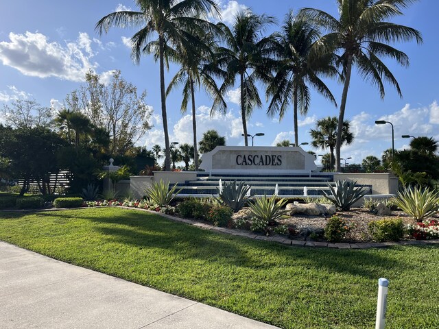 477 NW Blue Lake Dr, Port Saint Lucie, FL 34986 - community / neighborhood sign featuring a yard