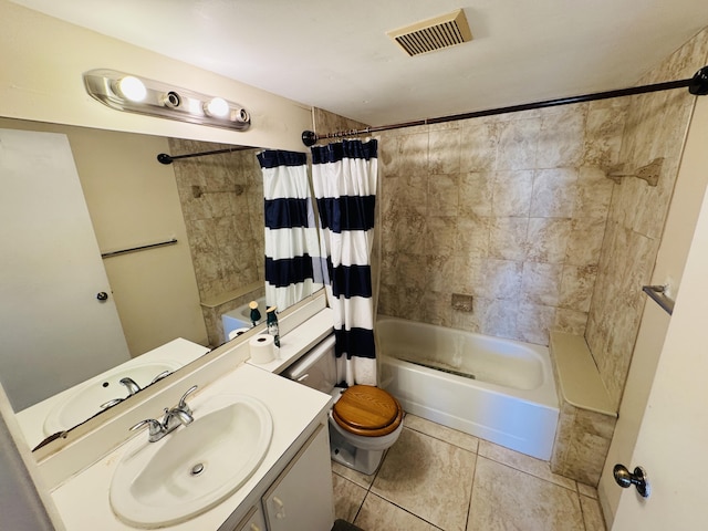 bathroom with visible vents, shower / tub combo, toilet, vanity, and tile patterned floors