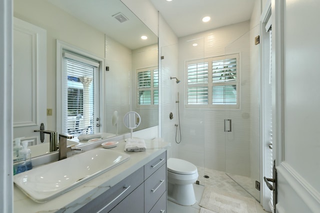 full bath with visible vents, toilet, recessed lighting, vanity, and a stall shower